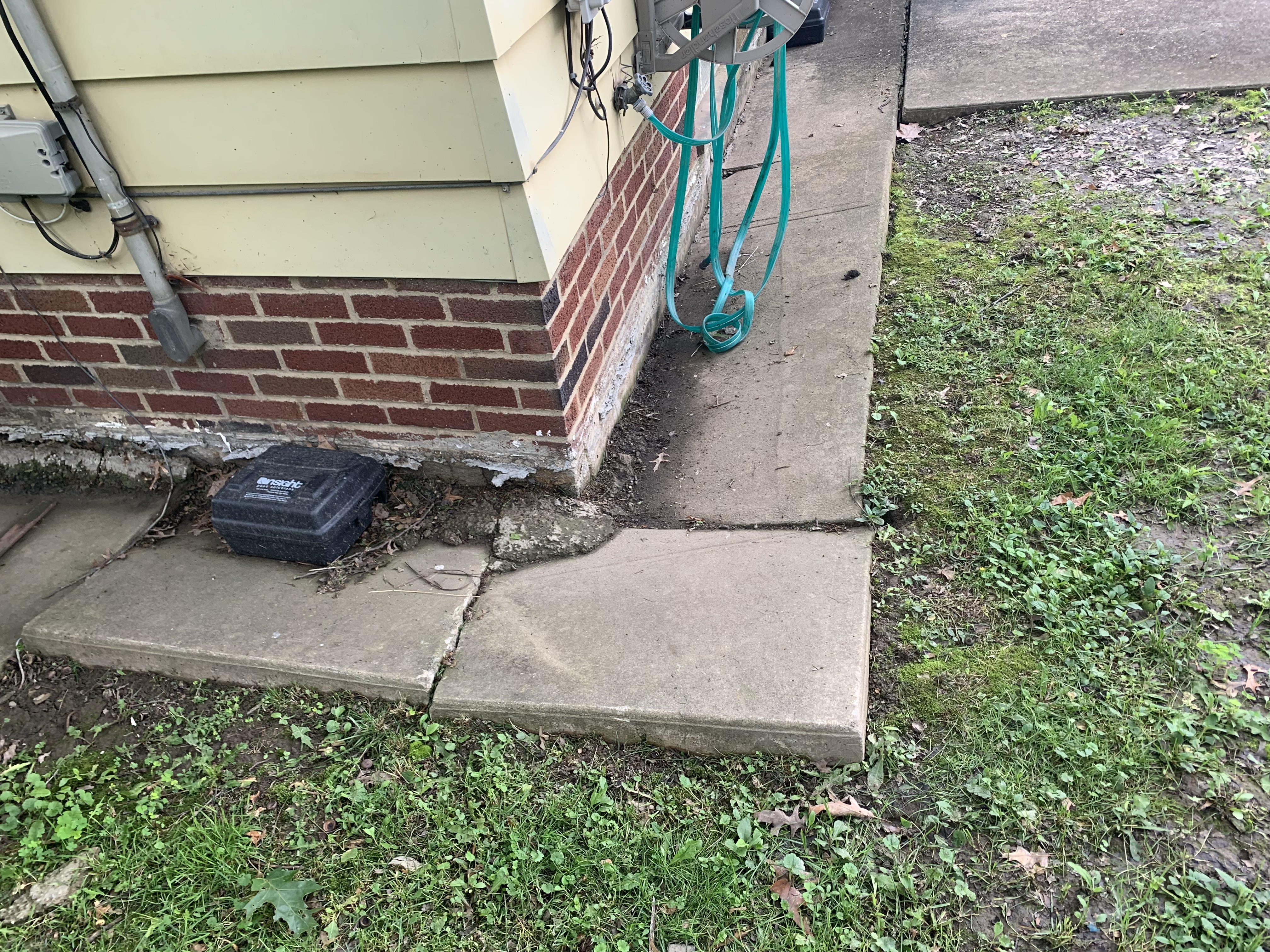 Ground eroded away beneath a concrete slab leaving a void