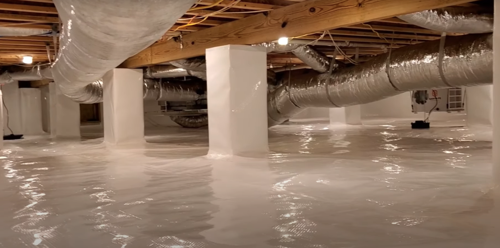 Crawl space encapsulation with sealed vapor barrier and moisture protection system installed