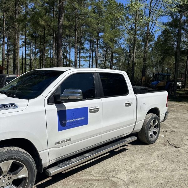 Company service truck ready for foundation repair and waterproofing jobs